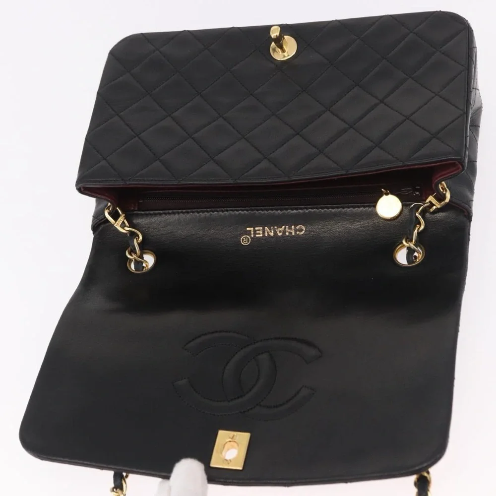 CHANEL Black Quilted Leather Shoulder Bag with Gold Hardware